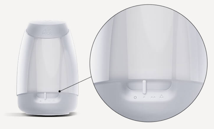 Displays the bottom of the Essential Mist® Diffuser device with a zoomed in portion on the mist frequency setting.