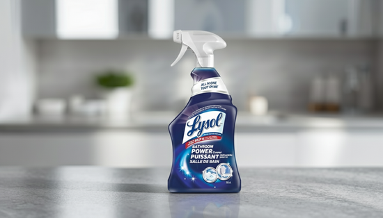 A front shot of a Lysol Bathroom Cleaner Spray bottle on a bathroom counter