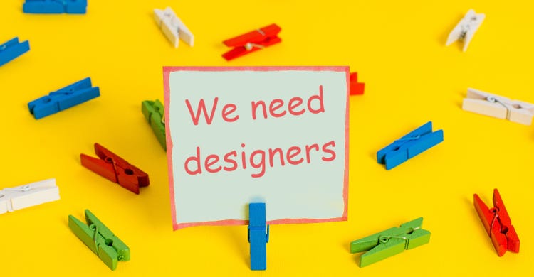 Need-Designers-Sign-AdobeStock_285950052-Artur.jpeg