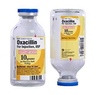 298490-The_secondary_label_panel_on_this_10g_Oxacillian_bottle_is_printed_upside_down_so_it_s_easy_to_read_when_it_s_hanging_at_a.jpg