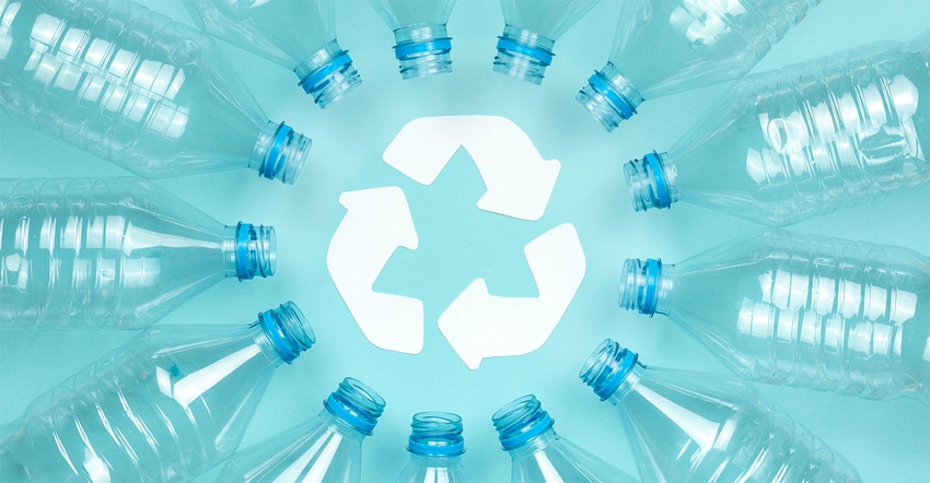 plastic bottles surrounding recycling symbol
