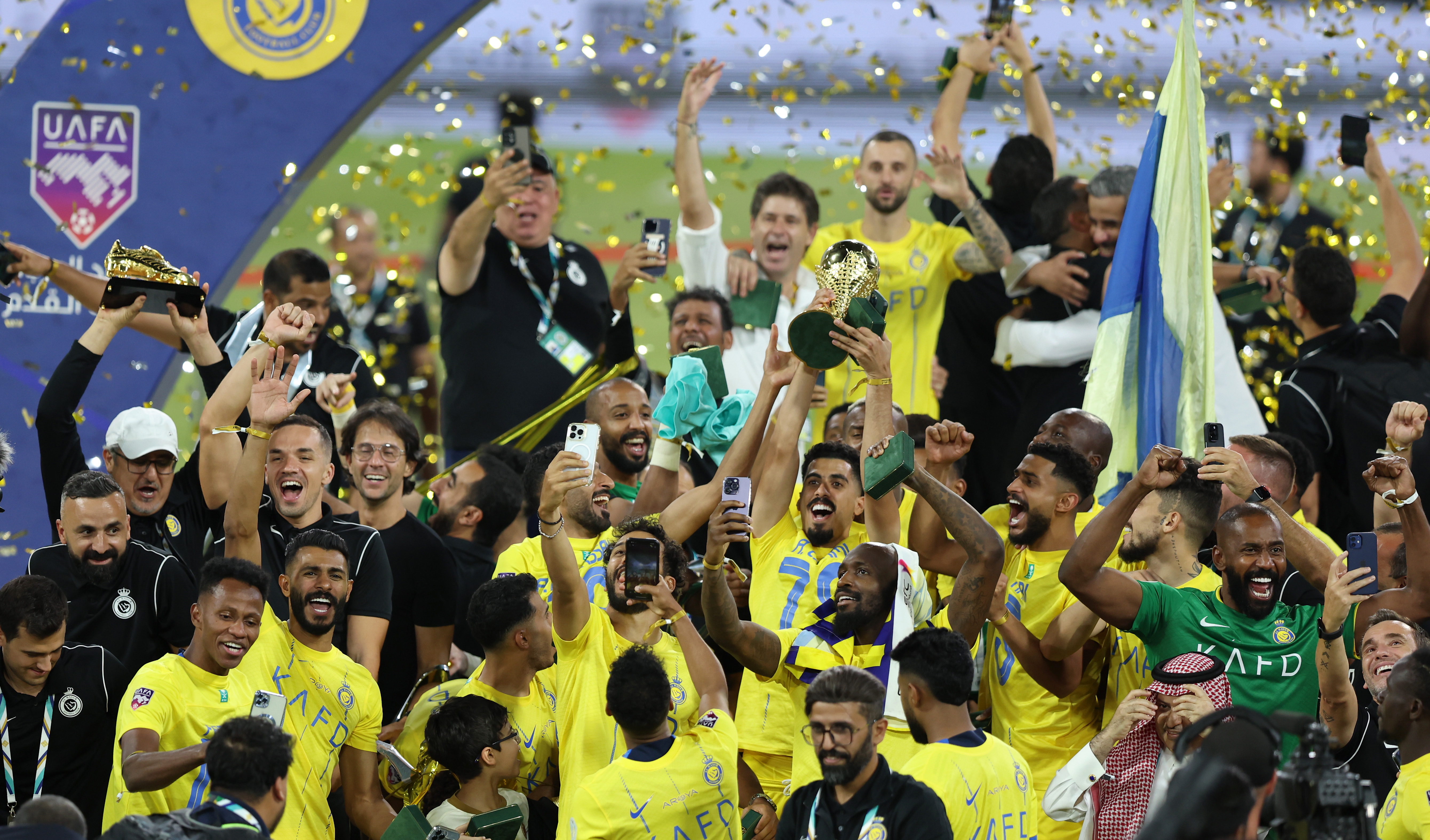 Donning Cristiano Ronaldo's Former Team's Colors, 68YO Mother Cheers On Al  Nassr Ahead of Arab Club Champions Cup Final - EssentiallySports