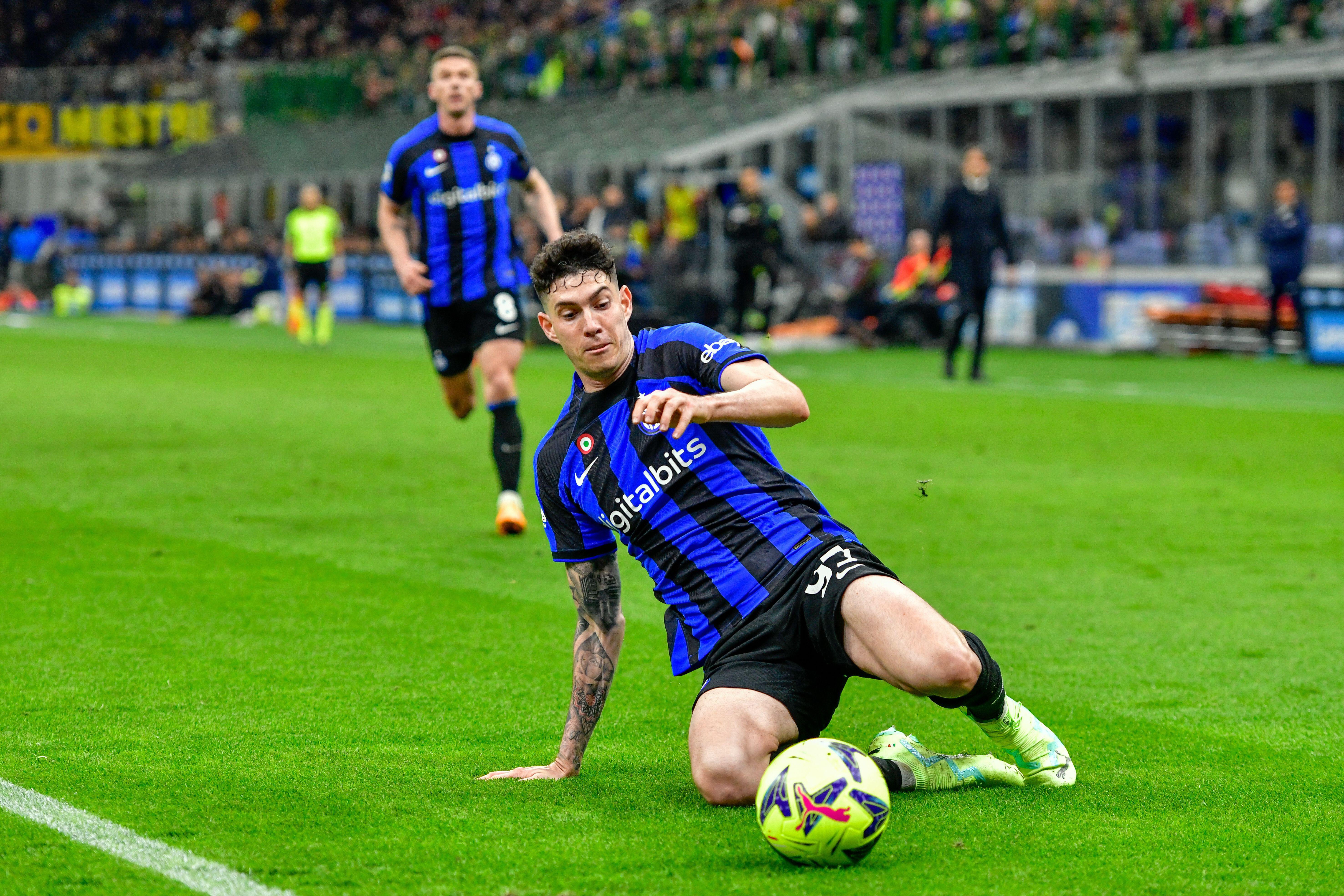 Inter Milan's Alessandro Bastoni, left, heads the ball past Manchester  City's Erling Haaland during the Champions League final soccer match  between Manchester City and Inter Milan at the Ataturk Olympic Stadium in