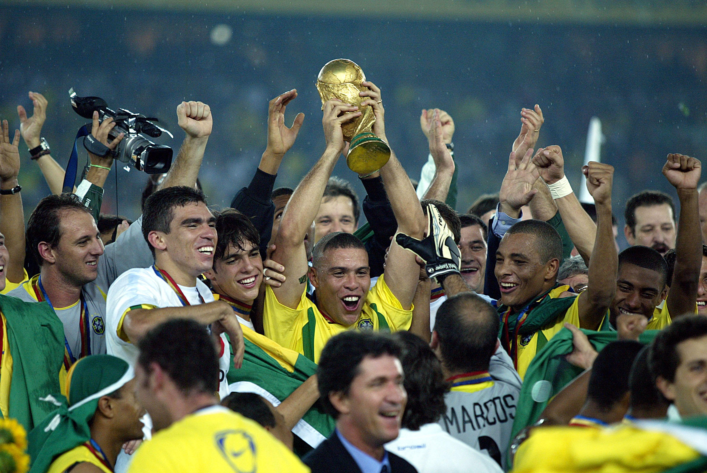 Ronaldo Nazario looks at his 2002 FIFA World Cup winners trophy