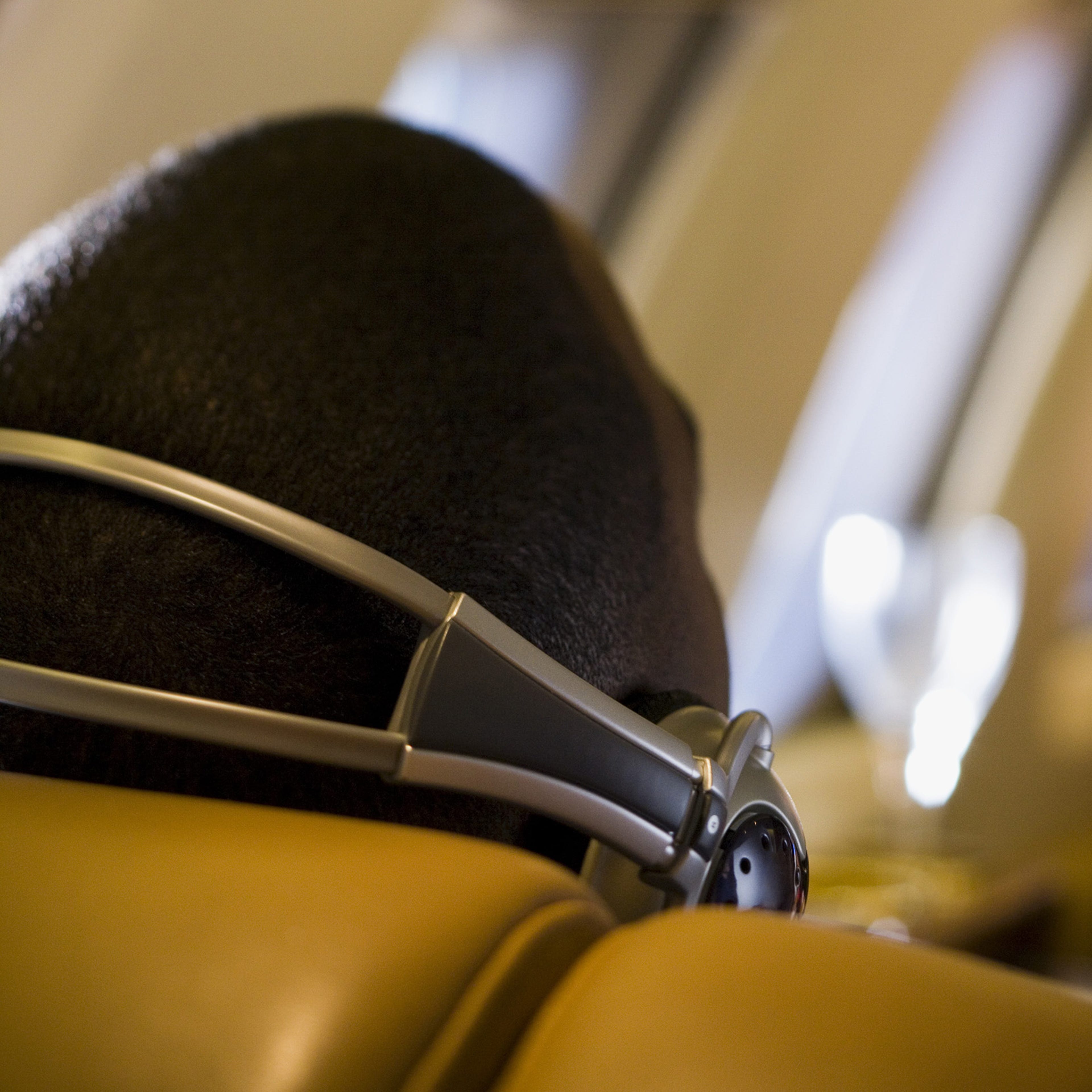 Backview of a man with head phones