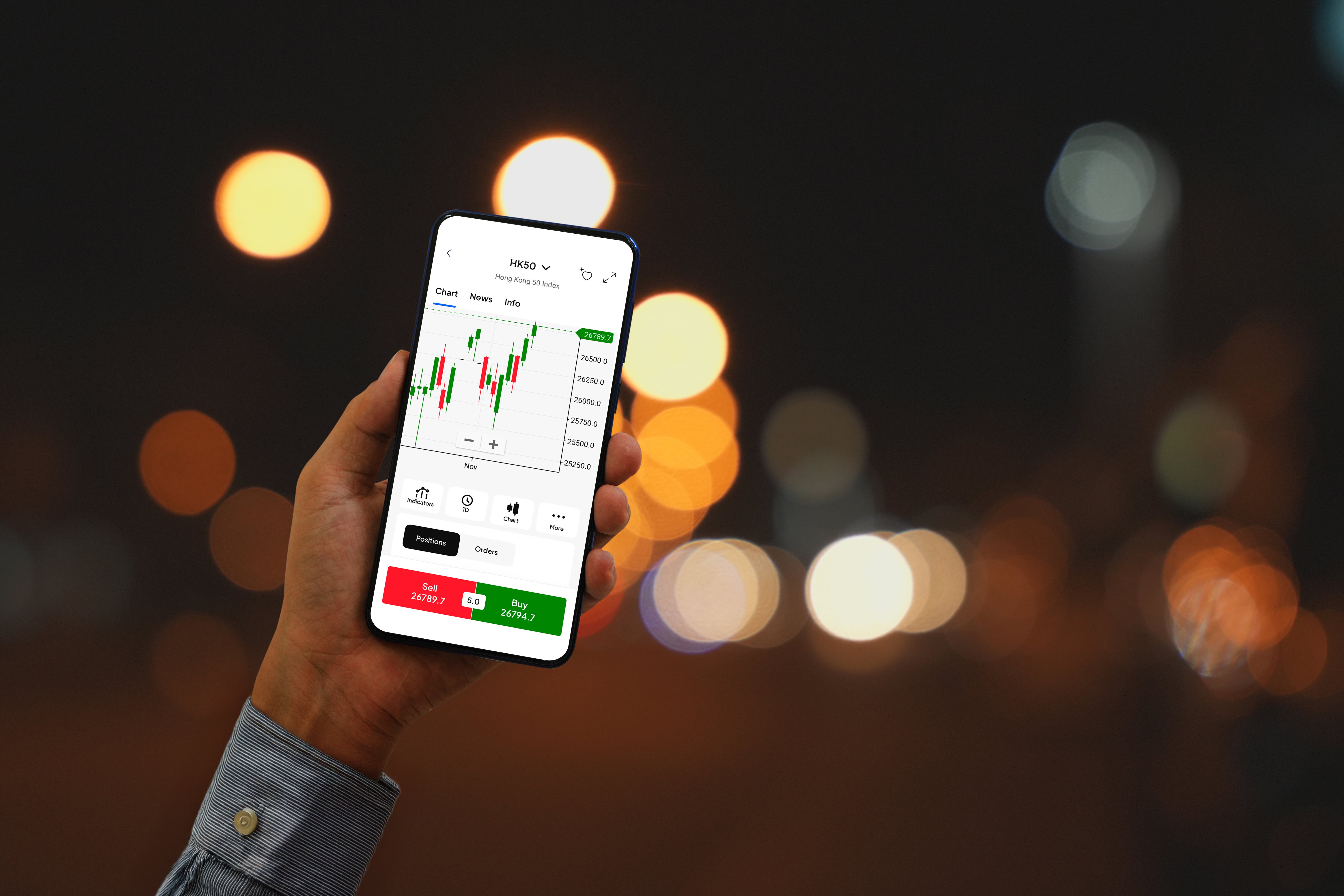 hand-holding-smartphone-with-blank-screen-at-night-2025-01-08-07-27-10-utc_1 (1).jpg