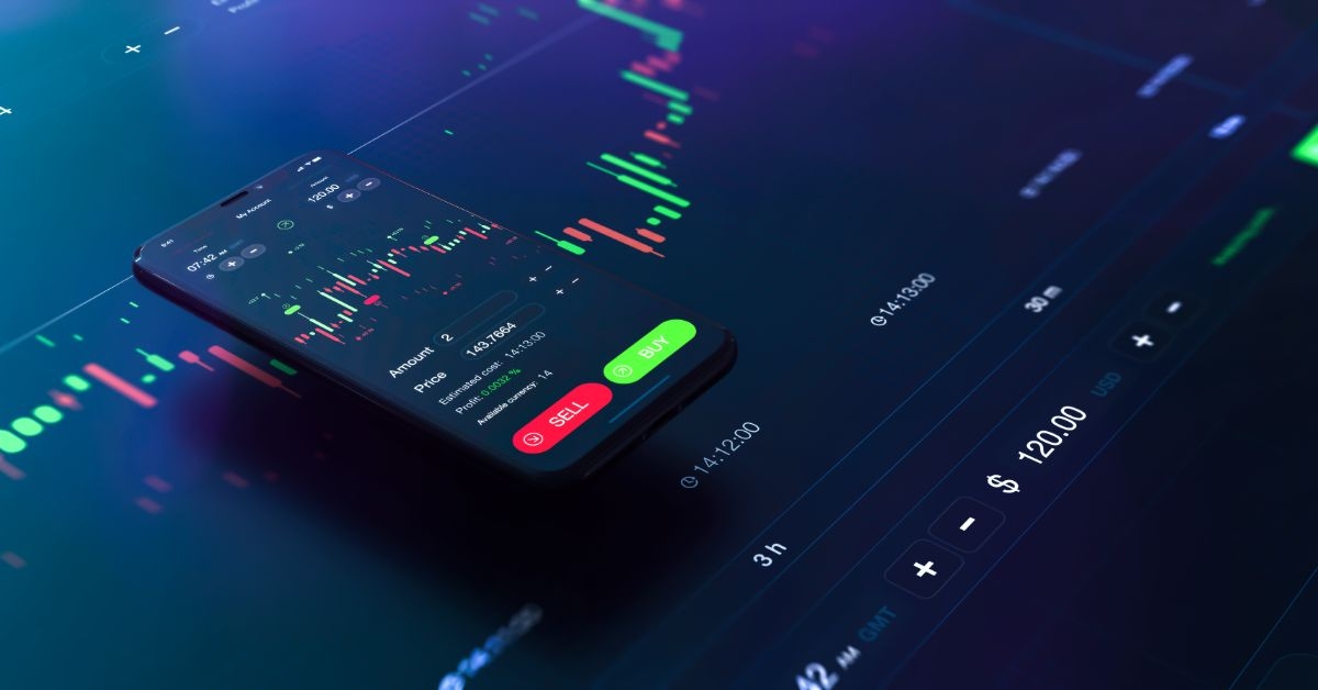 a phone with a stock chart on it.jpeg