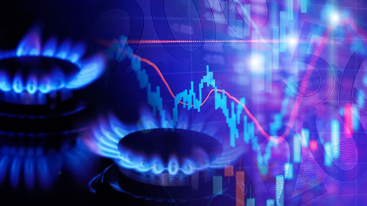 Blue flames from gas burners against a digital stock market graph, symbolizing energy prices and economic trends.jpg