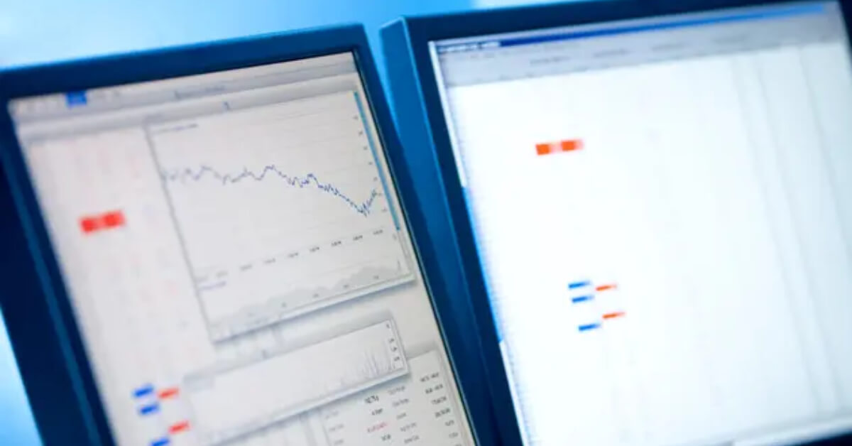 multiple_monitors_with_trading_charts.jpg