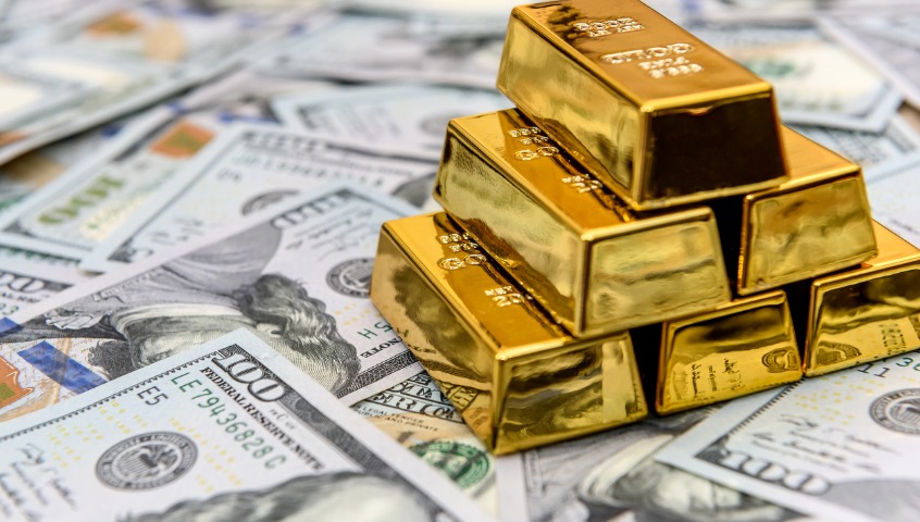 Oro brilla, dólar se debilita mientras el mercado espera el IPC de EE.UU.