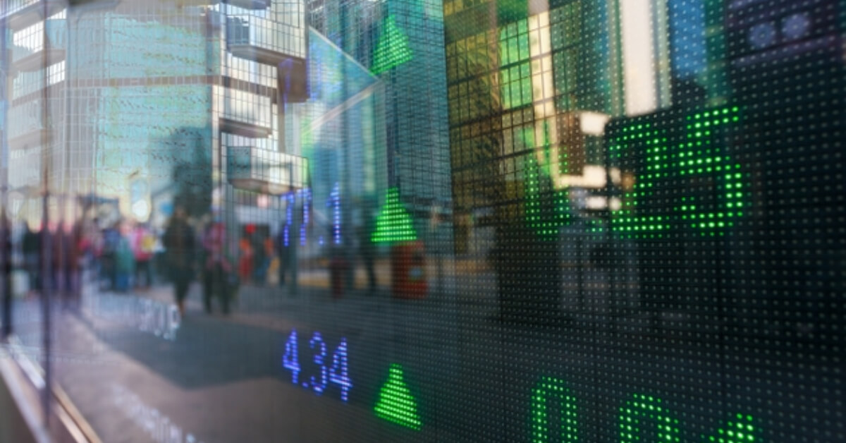 stock_market_displayed_on_wall_screen.jpg