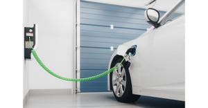Electric Car Charging In Private Garage At Home.jpg