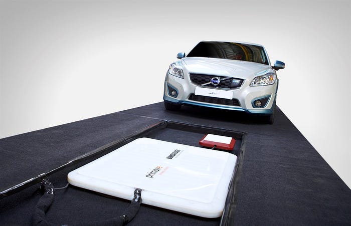 Volvo vehicle approaches a wireless charging pad