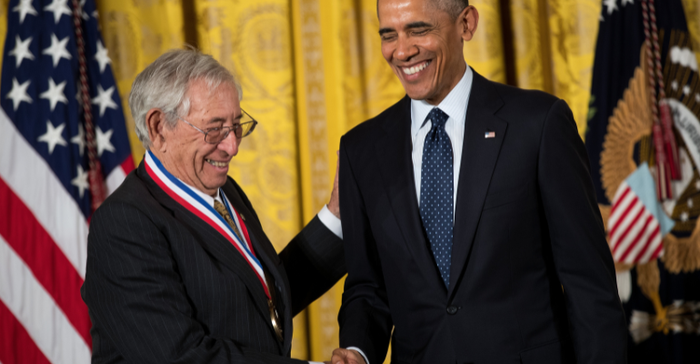 Robert Fischell shakes hands with President Barack Obama after receiving the National Medal of Technology and Innovation, during a ceremony in the East Room of the White House, May 19, 2016, in Washington, DC.