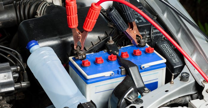 Car battery with jumper cable.