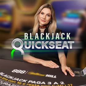 A live dealer conducting a Blackjack game at William Hill, showcasing the excitement of live casino gaming.