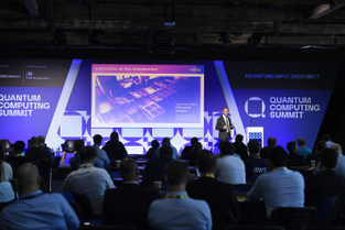 Speaker on stage at the Quantum Summit London