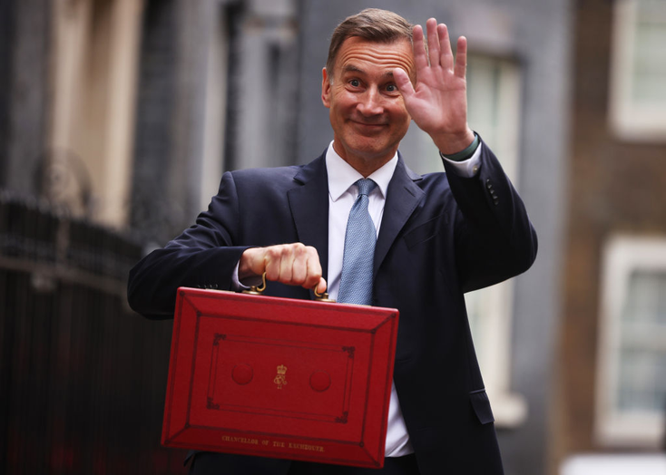 Chancellor of the exchequer Jeremy Hunt leaves Downing Street with his red budget box Chancellor of the exchequer Jeremy Hunt leaves Downing Street with his red budget box