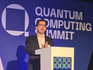 Omdia chief quantum computing analyst Sam Lucero on stage at last year's Quantum Computing Summit