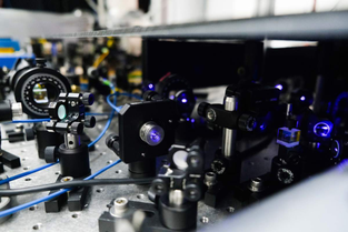 Optical technology used to create the laser pulses that control trapped ions