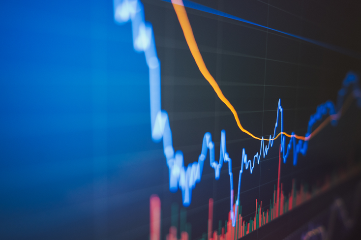 A computer screen showing a share price going down A computer screen showing a share price going down