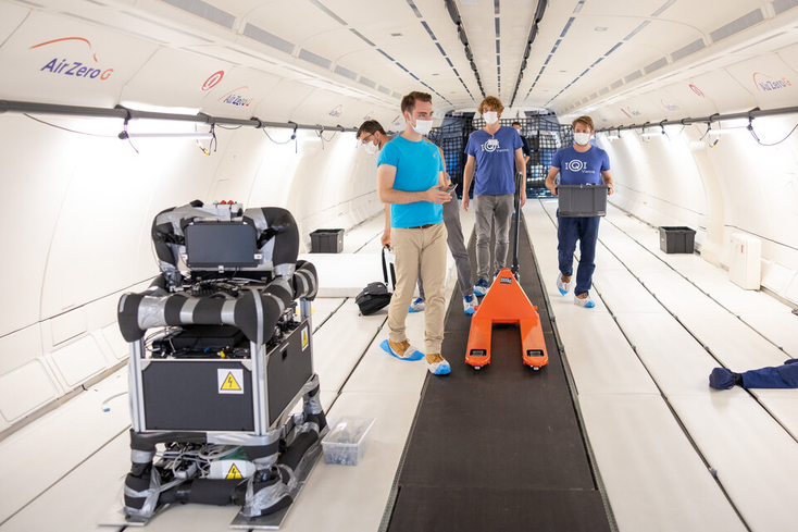 Quantum test equipment and scientists aboard the Air Zero-G aircraft. Quantum test equipment and scientists aboard the Air Zero-G aircraft.