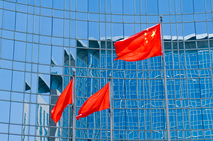 Chinese flags outside an office block