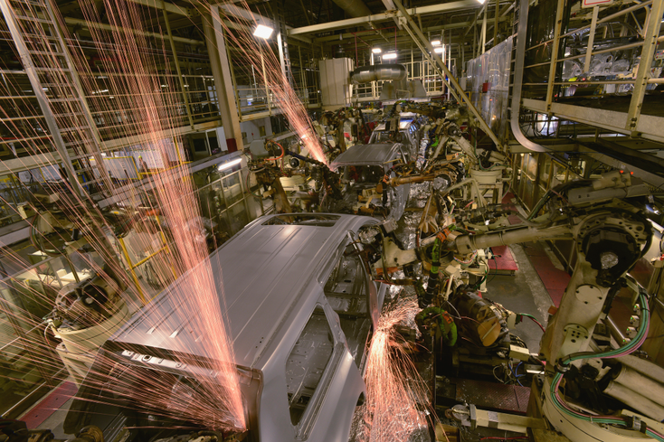 An automated factory making cars An automated factory making cars