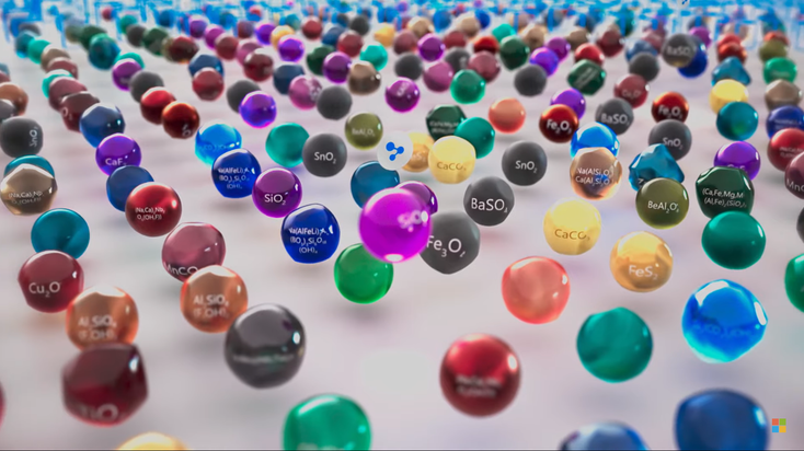 Many coloured balls with chemical formulae representing molecules