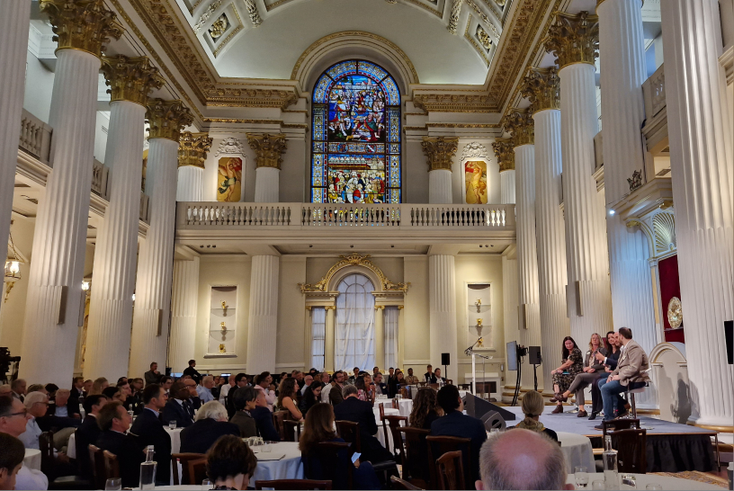 The panel in the grandiose setting of County Hall, London. 