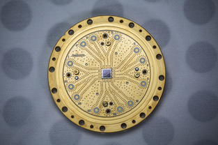 A Rigetti quantum processor, h=which is golden and circular. 