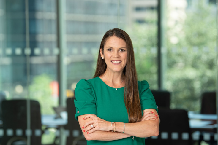 Photo of EY’s global innovation quantum leader Kristin Gilkes smiling and wearing a green dress with her arms folded Photo of EY’s global innovation quantum leader Kristin Gilkes smiling and wearing a green dress with her arms folded