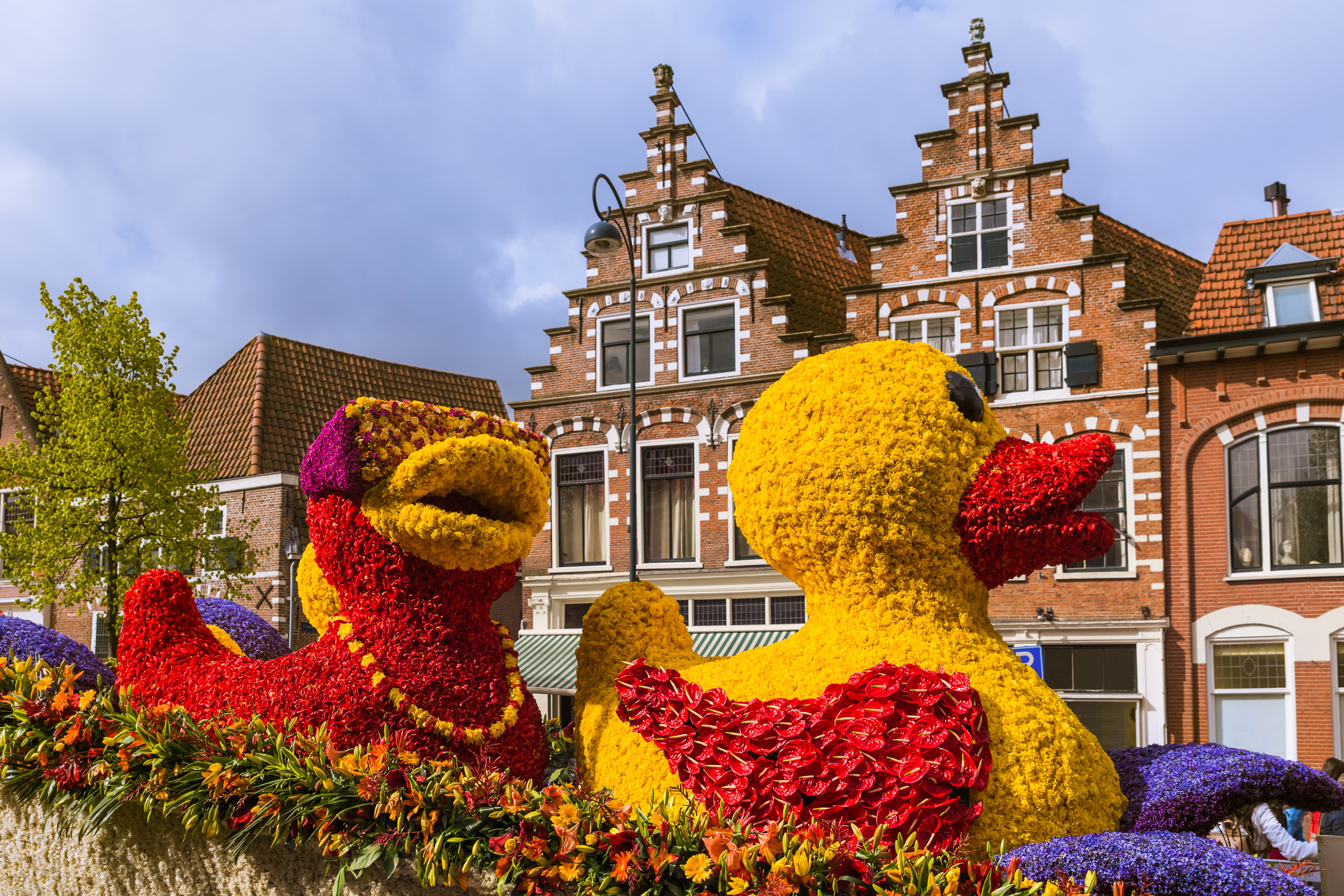 Admire the epic and colourful creations at the Flower Parade