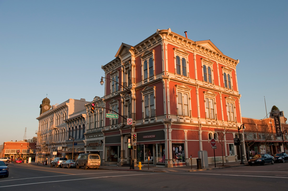 A striking red building in Sonoma, California, captures attention with its bold color and unique architectural style.