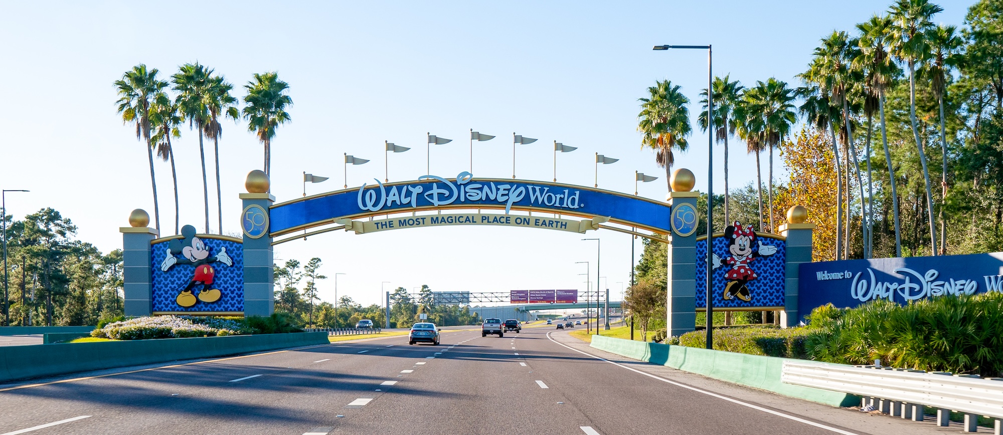 Disney World entrance with the iconic "Disney World" sign