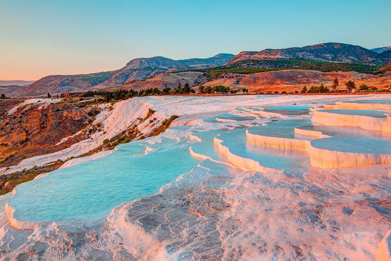 A serene view of Pamukkale's thermal pools, showcasing the beauty of Turkish baths