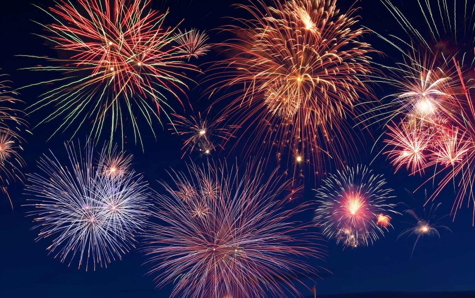 Colourful fireworks illuminate the night sky during a Disneyland celebration