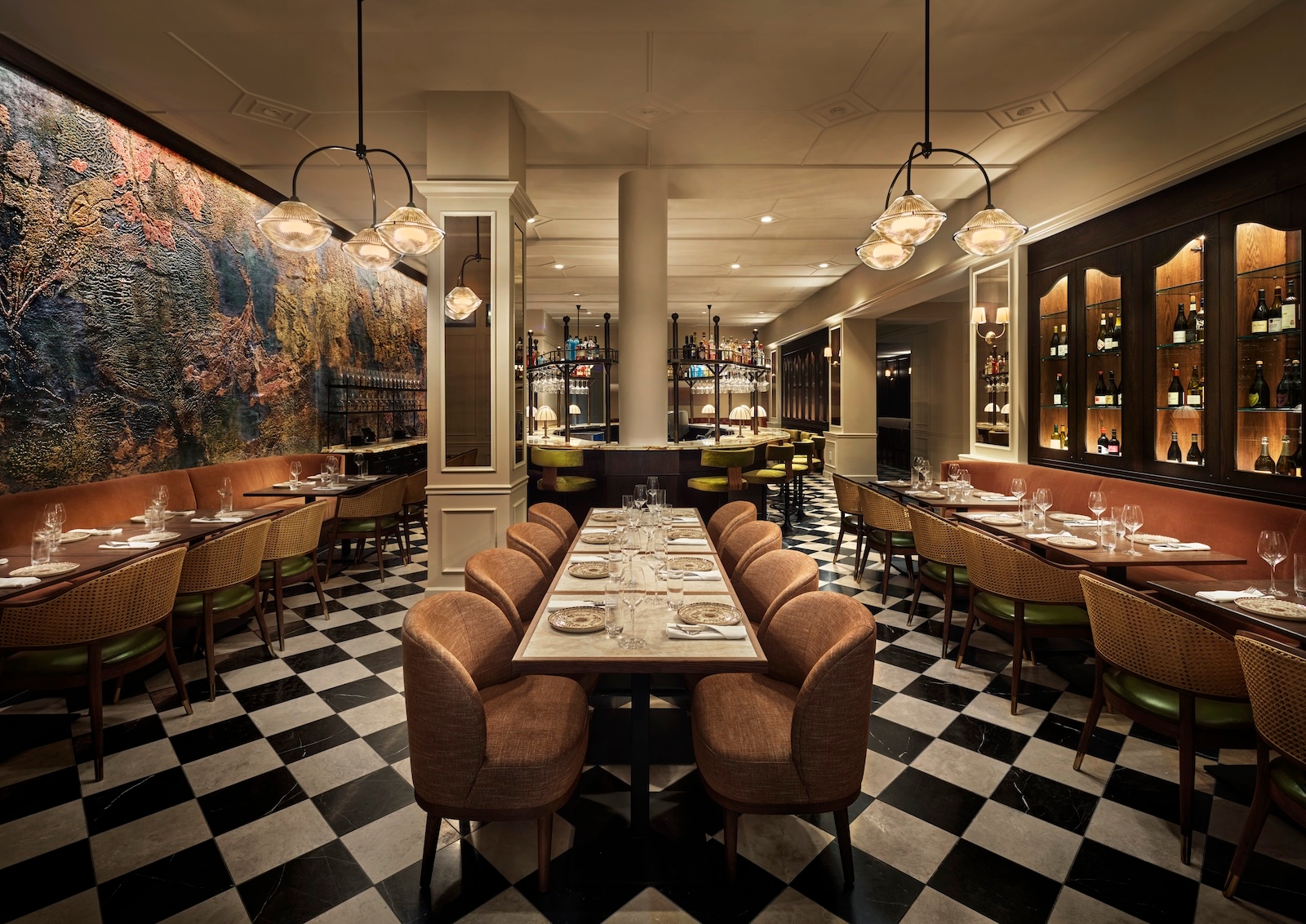 Elegant dining room at Sixty DC, a Mediterranean restaurant in Washington, featuring stylish decor and ambient lighting