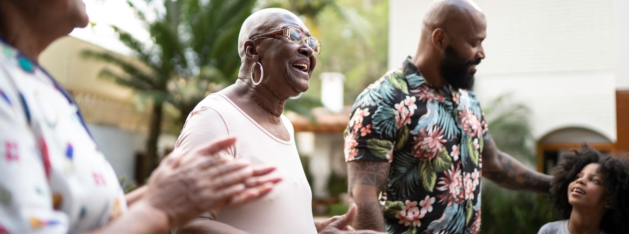 A family laughs walking in New Orleans