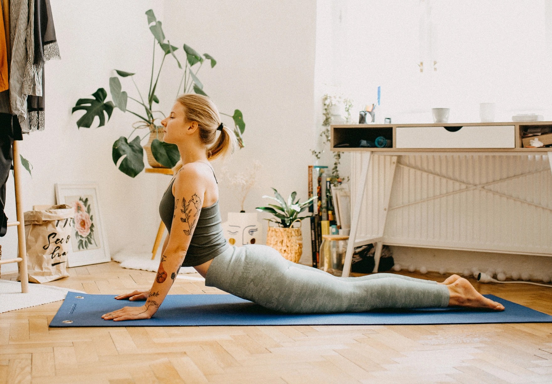 woman doing yoga with plants.jpg