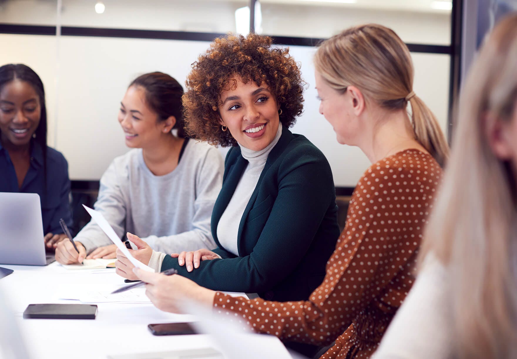 Women collaborating around a table.jpg