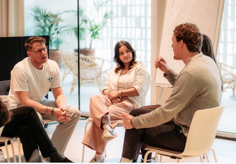 DataSnipper Amsterdam office — colleagues in conversation