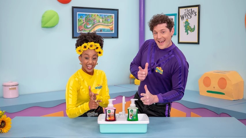 two people washing hands