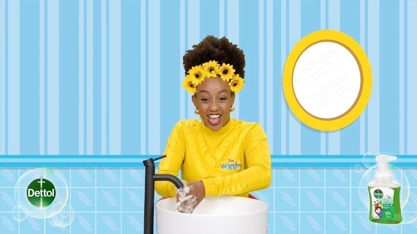 a woman washing hands on an animated background
