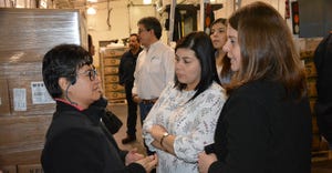 Alejandra Valdez (left), USMEF technical services manager for Mexico, Central America and the Dominican Republic, discusses l