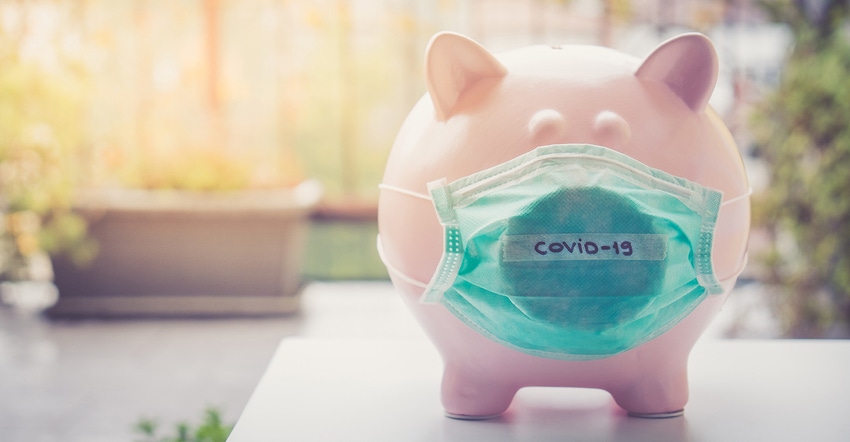 Piggy bank with a COVID-19 mask Piggy bank with a COVID-19 mask