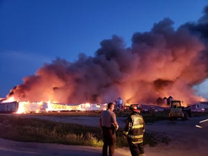 The fire consumed almost three acres of buildings on Borgic's southwestern Illinois 6,000 breed-to-wean operation.
