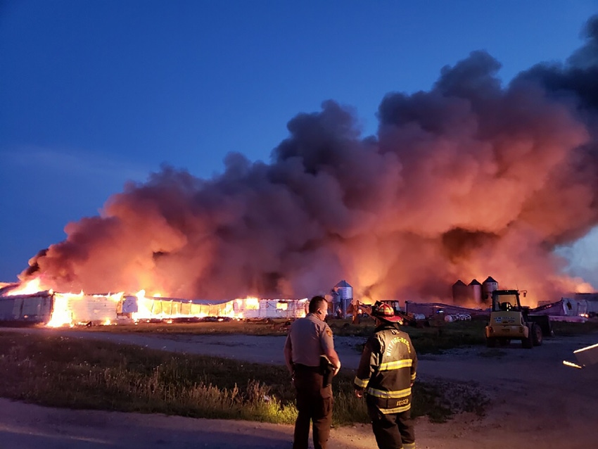 The fire consumed almost three acres of buildings on Borgic's southwestern Illinois 6,000 breed-to-wean operation.