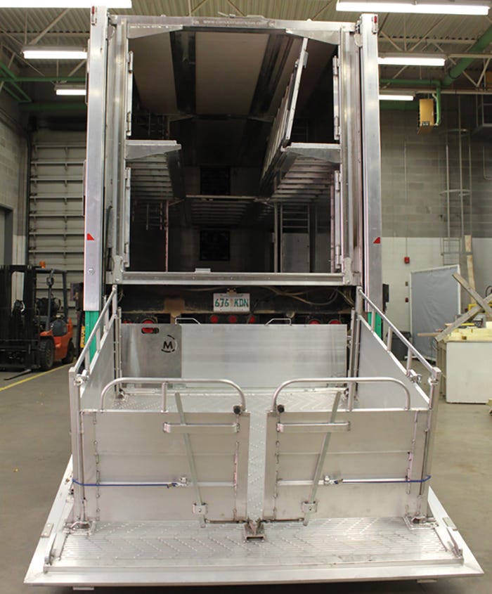 To address animal handling and welfare issues arising from loading and unloading in the conventional livestock trailer, a 1,000-kilogram-capacity hydraulic loading platform was added in the prototype trailer built at the Prairie Swine Centre.