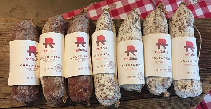 To meet Red Table’s needs, pigs need to be fed a barley, small-grain ration: no corn or soy. Barley and small-grain diets often result in meat with supersaturated fat — a very hard, crystallized fat. Red Table’s Chuck Fred and Salbando salumi are shown